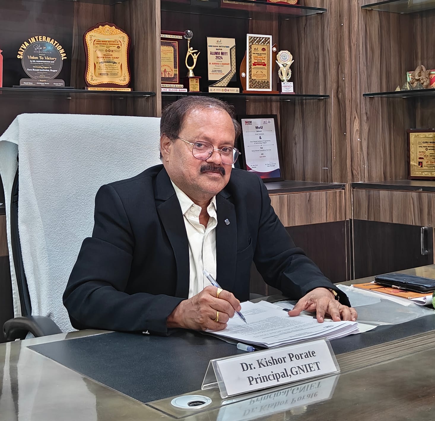 Dr. Kishor Porate