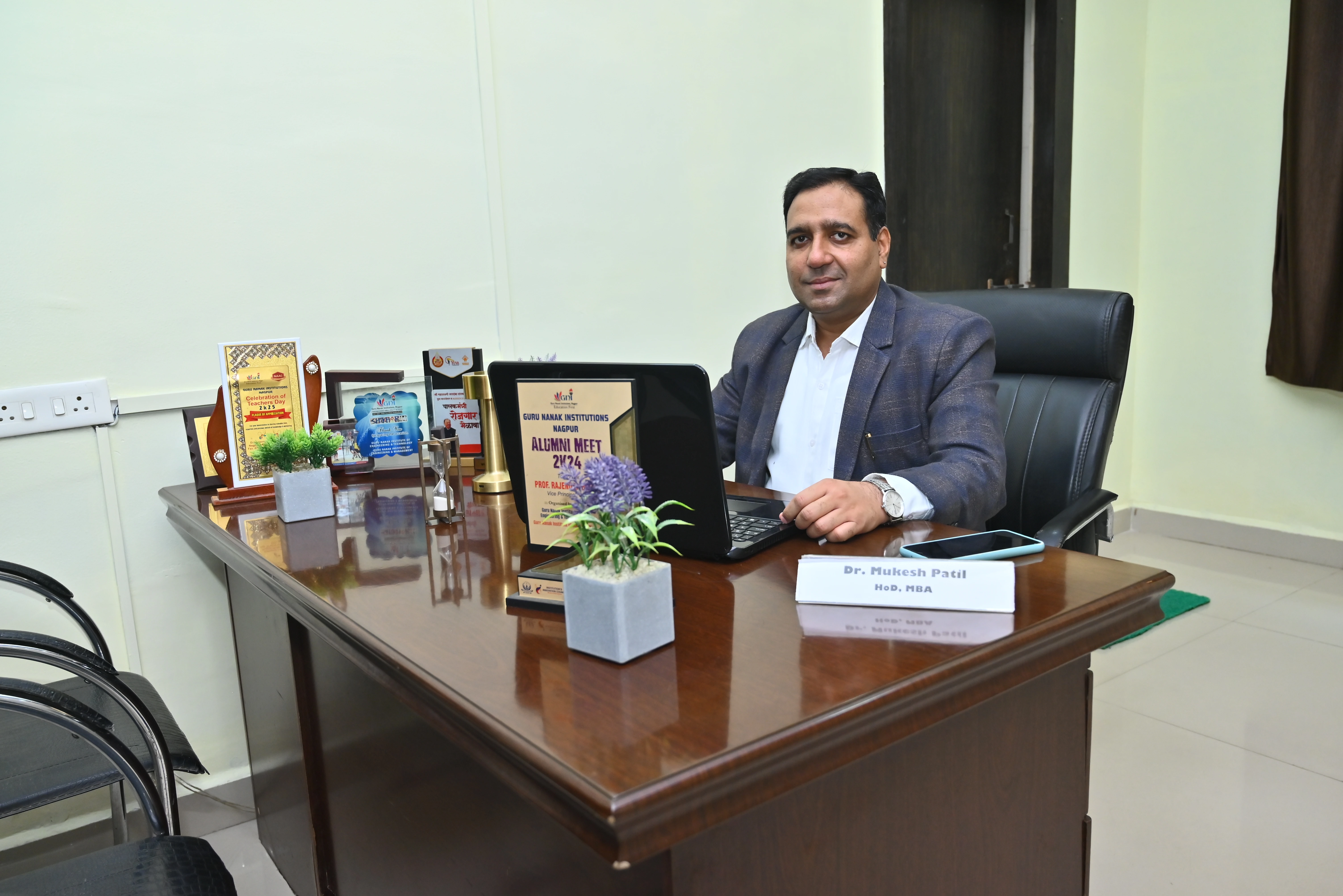 Dr. Mukesh Patil